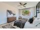 This bedroom features a large window with natural lighting at 5873 Skyfall Ct, Las Vegas, NV 89135