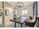 Stylish home office featuring modern lighting, sleek workspace, and neutral decor with great natural light at 5873 Skyfall Ct, Las Vegas, NV 89135
