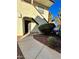 Charming unit A entrance with covered walkway and desert landscaping on a sunny day at 6137 W Oakey Blvd # A, Las Vegas, NV 89146