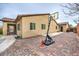 Spacious backyard with basketball hoop and brick paved patio at 8351 Agave Bloom St, Las Vegas, NV 89131
