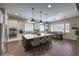 Spacious kitchen featuring granite countertops, stainless steel appliances, and large island at 8351 Agave Bloom St, Las Vegas, NV 89131