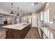 Beautiful kitchen with large island, granite countertops, stainless appliances and ample storage at 8351 Agave Bloom St, Las Vegas, NV 89131