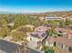 Aerial view of the house and surrounding neighborhood at 120 Emerald Dunes Cir, Henderson, NV 89052
