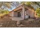 Covered patio and built-in grill in the backyard at 120 Emerald Dunes Cir, Henderson, NV 89052