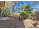 Relaxing backyard with gravel and palm trees at 120 Emerald Dunes Cir, Henderson, NV 89052