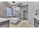 Large bathroom with soaking tub, walk-in shower, and double vanity at 120 Emerald Dunes Cir, Henderson, NV 89052