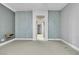 Bright bedroom with an ensuite bathroom and neutral decor at 120 Emerald Dunes Cir, Henderson, NV 89052