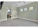 Bright bedroom with tile floors and a ceiling fan at 120 Emerald Dunes Cir, Henderson, NV 89052