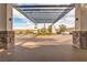 Elegant community entrance with stone pillars and covered walkway at 120 Emerald Dunes Cir, Henderson, NV 89052