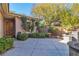 Landscaped courtyard with fire pit and Japanese-style accents at 120 Emerald Dunes Cir, Henderson, NV 89052
