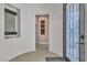 Elegant entryway with a water feature and stained glass door at 120 Emerald Dunes Cir, Henderson, NV 89052