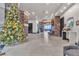 Bright hallway with stone accents and Christmas tree at 120 Emerald Dunes Cir, Henderson, NV 89052