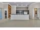 Modern kitchen with granite countertops and dark wood cabinets at 120 Emerald Dunes Cir, Henderson, NV 89052