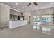 Open concept kitchen boasting granite countertops and stainless steel appliances at 120 Emerald Dunes Cir, Henderson, NV 89052