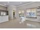 Bright kitchen features stainless steel appliances and an island at 120 Emerald Dunes Cir, Henderson, NV 89052