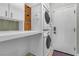 Laundry room with washer, dryer and storage at 120 Emerald Dunes Cir, Henderson, NV 89052