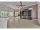 Bright living room featuring tile floors and a fireplace at 120 Emerald Dunes Cir, Henderson, NV 89052