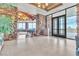 Lobby with stone wall, seating area, and outside view at 120 Emerald Dunes Cir, Henderson, NV 89052