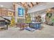 Spacious lobby with fireplace, seating area, and Christmas trees at 120 Emerald Dunes Cir, Henderson, NV 89052