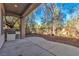 Covered patio with built-in grill and desert landscaping at 120 Emerald Dunes Cir, Henderson, NV 89052