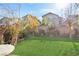 Landscaped backyard with grassy area at 4343 Countryside Glen Ct, North Las Vegas, NV 89084