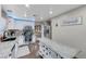 Modern kitchen with granite countertops and white cabinets at 6341 W Haleh Ave, Las Vegas, NV 89141