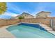 Stunning pool with spacious deck and decorative features at 6341 W Haleh Ave, Las Vegas, NV 89141