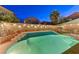 Inviting backyard pool with tiled coping and surrounding landscaping at 6341 W Haleh Ave, Las Vegas, NV 89141