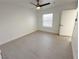 Bedroom featuring hardwood-style flooring, ceiling fan, and a window at 7255 W Sunset Rd # 2046, Las Vegas, NV 89113