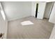 Well-lit bedroom showcasing neutral walls, stylish flooring, and a closet for optimal storage at 7255 W Sunset Rd # 2046, Las Vegas, NV 89113