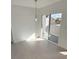 Living room with sliding door to a private outdoor patio at 7255 W Sunset Rd # 2046, Las Vegas, NV 89113