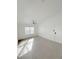 Sunlit living room with light colored flooring and ceiling fan at 7255 W Sunset Rd # 2046, Las Vegas, NV 89113