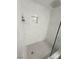 Modern walk-in shower with beautiful tile work and a rainfall showerhead at 7255 W Sunset Rd # 2046, Las Vegas, NV 89113