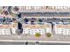 Overhead view of condo community, featuring palm trees and covered parking at 2056 Mesquite Ln # 303, Laughlin, NV 89029