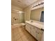 This bathroom features neutral walls, tile flooring, and a tub shower combo at 2056 Mesquite Ln # 303, Laughlin, NV 89029