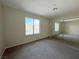 This bedroom features natural light, a large closet, and carpet flooring at 2056 Mesquite Ln # 303, Laughlin, NV 89029