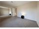 This bedroom features neutral walls, a large mirrored closet, and carpet flooring at 2056 Mesquite Ln # 303, Laughlin, NV 89029