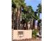 A close view of the Portofino Condominiums community sign with palm trees at 2056 Mesquite Ln # 303, Laughlin, NV 89029
