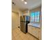 Bright kitchen with stainless steel fridge and white countertops at 2056 Mesquite Ln # 303, Laughlin, NV 89029