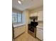 Kitchen features stainless steel stove and white cabinets at 2056 Mesquite Ln # 303, Laughlin, NV 89029