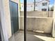Outdoor patio with sliding glass doors, providing a private outdoor space at 2100 Black Island St # 101, Las Vegas, NV 89128