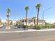 Exterior street view of a garden-style apartment complex, with street sign at 2100 Black Island St # 101, Las Vegas, NV 89128