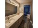 Bathroom features a double sink vanity with modern fixtures and leads to the main bedroom at 2725 S Nellis Blvd # 1105, Las Vegas, NV 89121