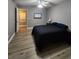 Bedroom features hardwood floors, a ceiling fan, and natural lighting at 2725 S Nellis Blvd # 1105, Las Vegas, NV 89121