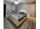 Bedroom with hardwood flooring, ceiling fan and a large window with window seat at 2725 S Nellis Blvd # 1105, Las Vegas, NV 89121