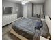 Bedroom featuring hardwood floors, ceiling fan, window seat, and dresser at 2725 S Nellis Blvd # 1105, Las Vegas, NV 89121