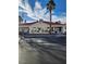 Community clubhouse exterior with parking spaces and landscaping at 2725 S Nellis Blvd # 1105, Las Vegas, NV 89121