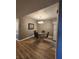 Dining room features hardwood floors, and a modern chandelier at 2725 S Nellis Blvd # 1105, Las Vegas, NV 89121