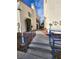 Apartment complex with manicured landscaping, colorful foliage, and walkways at 2725 S Nellis Blvd # 1105, Las Vegas, NV 89121