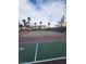 Outdoor tennis court surrounded by palm trees at 2725 S Nellis Blvd # 1105, Las Vegas, NV 89121
